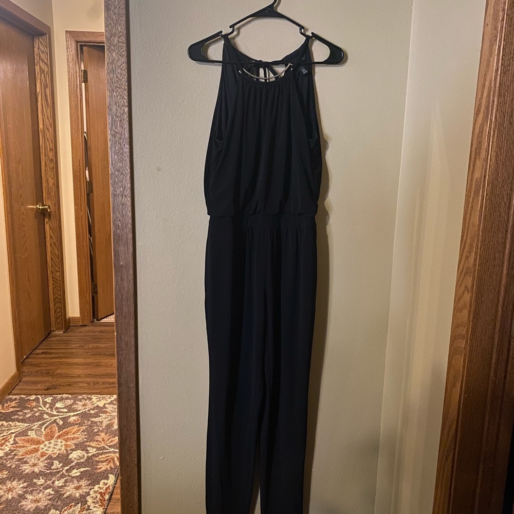 White House, Black Market black jumpsuit. Size 4.